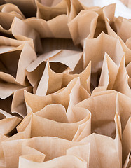 Image showing Brown paper disposable bags in the pile