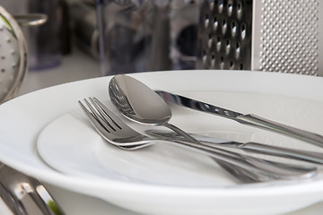 Image showing Fork, Spoon and Table Knife on the white background