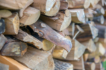 Image showing dry chopped firewood logs in a pile