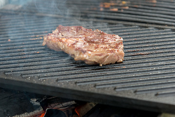 Image showing beef steaks on the grill