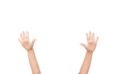 Image showing close up of little child hands raised upwards