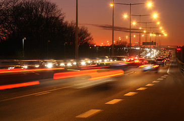 Image showing cars at night with motion blur