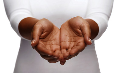 Image showing female empty cupped hands showing something