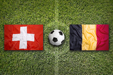 Image showing Switzerland vs. Belgium flags on soccer field