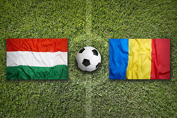 Image showing Hungary vs. Romania flags on soccer field