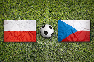 Image showing Poland vs. Czech Republic flags on soccer field