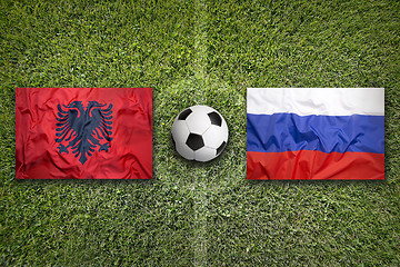 Image showing Albania vs. Russia flags on soccer field