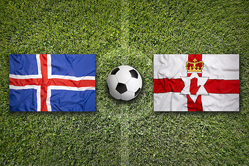 Image showing Iceland vs. Northern Ireland flags on soccer field