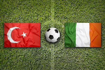 Image showing Turkey vs. Ireland flags on soccer field