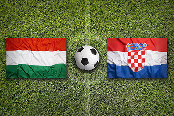 Image showing Hungary vs. Croatia flags on soccer field