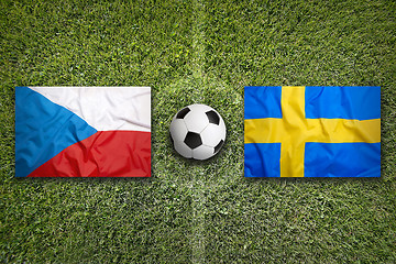 Image showing Czech Republic vs. Sweden flags on soccer field