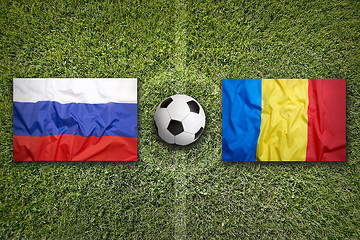 Image showing Russia vs. Romania flags on soccer field