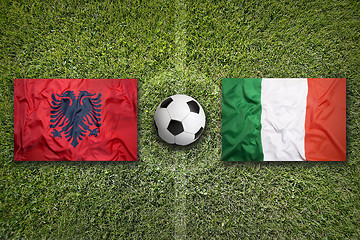 Image showing Albania vs. Italy flags on soccer field