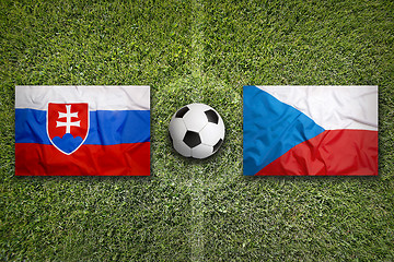 Image showing Slovakia vs. Czech Republic flags on soccer field