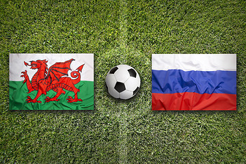 Image showing Wales vs. Russia flags on soccer field