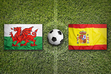 Image showing Wales vs. Spain flags on soccer field