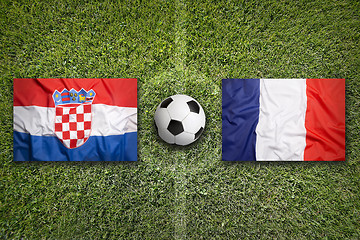 Image showing Croatia vs. France flags on soccer field