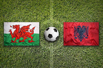 Image showing Wales vs. Albania flags on soccer field