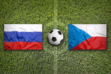 Image showing Russia vs. Czech Republic flags on soccer field