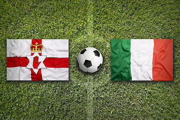 Image showing Northern Ireland vs. Italy flags on soccer field