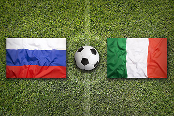 Image showing Russia vs. Italy flags on soccer field