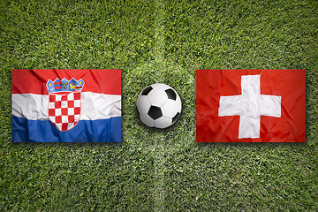 Image showing Croatia vs. Switzerland flags on soccer field