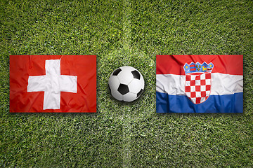 Image showing Switzerland vs. Croatia flags on soccer field