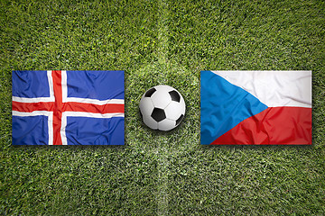 Image showing Iceland vs. Czech Republic flags on soccer field
