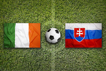 Image showing Ireland vs. Slovakia flags on soccer field