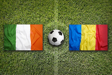 Image showing Ireland vs. Romania flags on soccer field