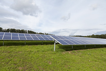 Image showing Field with blue siliciom solar cells alternative energy