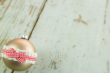 Image showing Three Christmas baubles on rustic wood