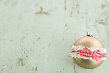 Image showing Three Christmas baubles on rustic wood