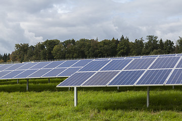 Image showing Field with blue siliciom solar cells alternative energy