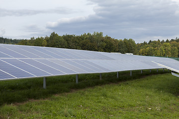 Image showing Field with blue siliciom solar cells alternative energy