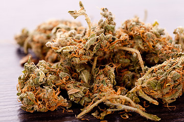 Image showing Close up Dried Marijuana Leaves on the Table