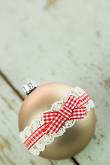 Image showing Three Christmas baubles on rustic wood