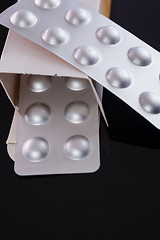 Image showing Silver blister pack of small pills