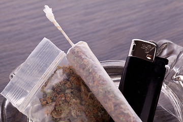 Image showing Close up of marijuana and smoking paraphernalia