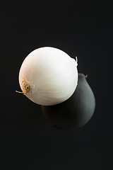 Image showing Three whole fresh raw white onions