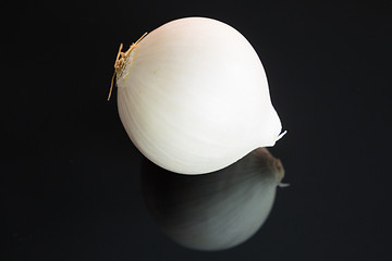 Image showing Three whole fresh raw white onions
