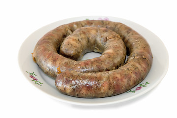 Image showing Fried pork sausage are homemade on a white background.