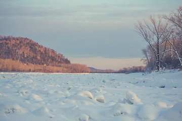 Image showing winter landscape of snow-covered fields, trees 