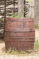 Image showing Old wooden barrel adapted as a bed for flowers