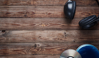 Image showing top view of music cd player equipment on wooden desk