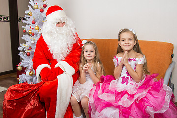 Image showing The girls are asking for frost grandfather to give them gifts