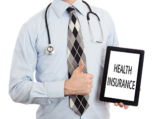 Image showing Doctor holding tablet - Health insurance