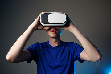 Image showing Man wearing virtual reality goggles.