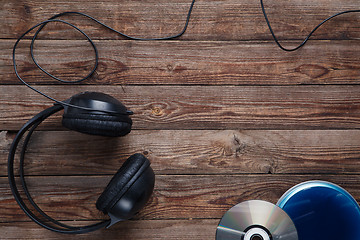 Image showing top view of music cd player equipment on wooden desk