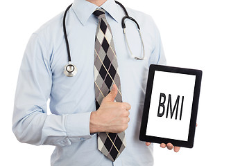 Image showing Doctor holding tablet - BMI